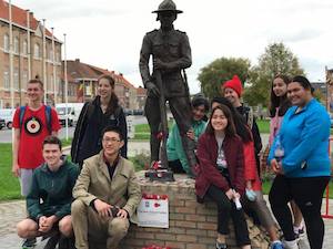 Students at the Messines memorial statue